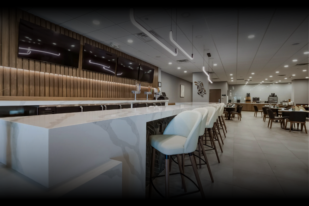 modern bar at Rooh Nashville with cocktails, ambient lighting, and contemporary restaurant design